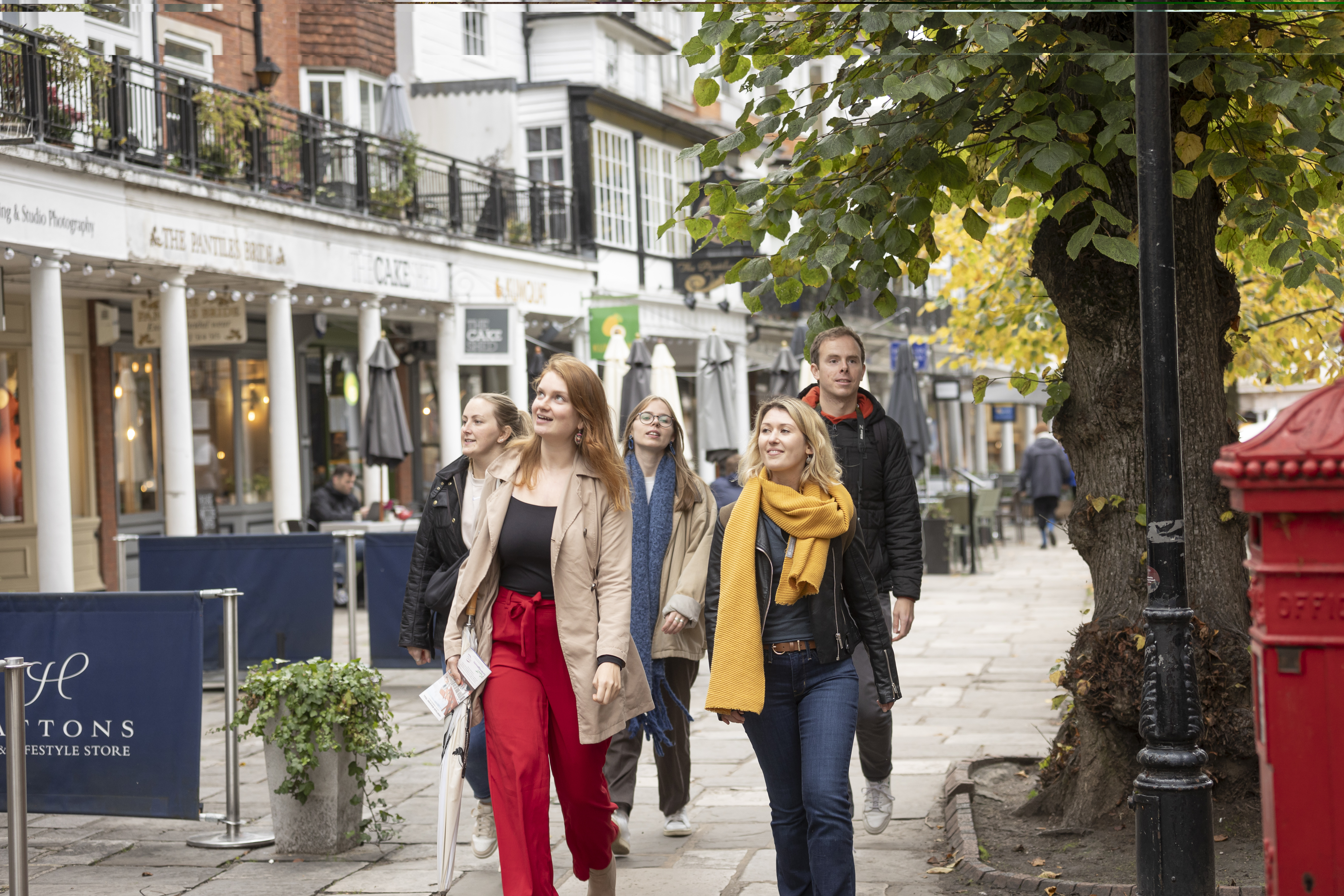Group walking through The Pantiles