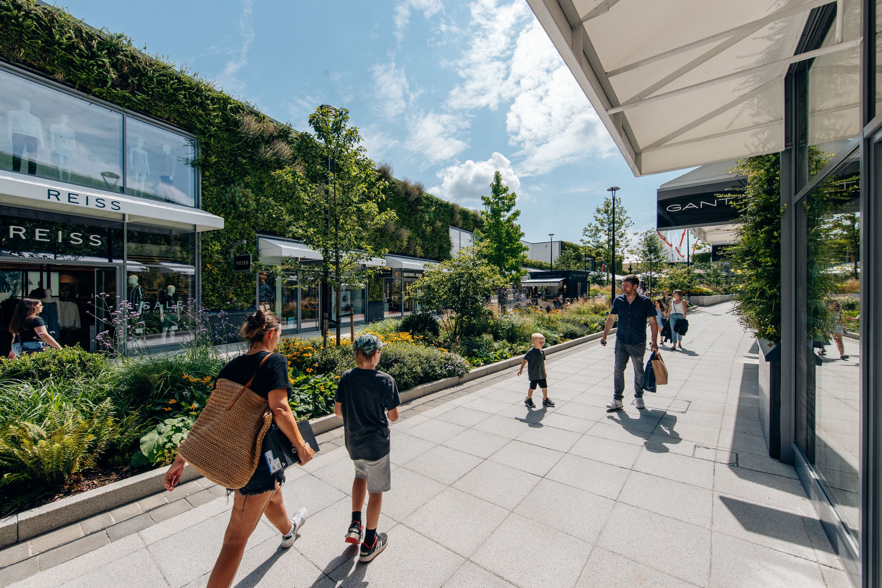 People shopping at Ashford Designer Outlet