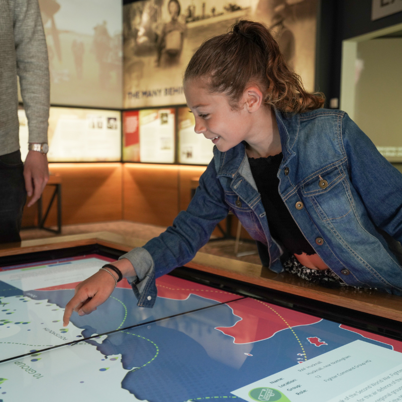 Girl pointing at map