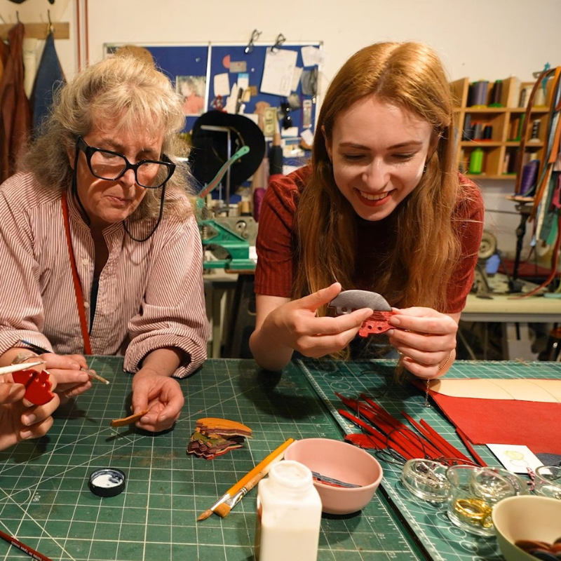Two women working at creative workshop