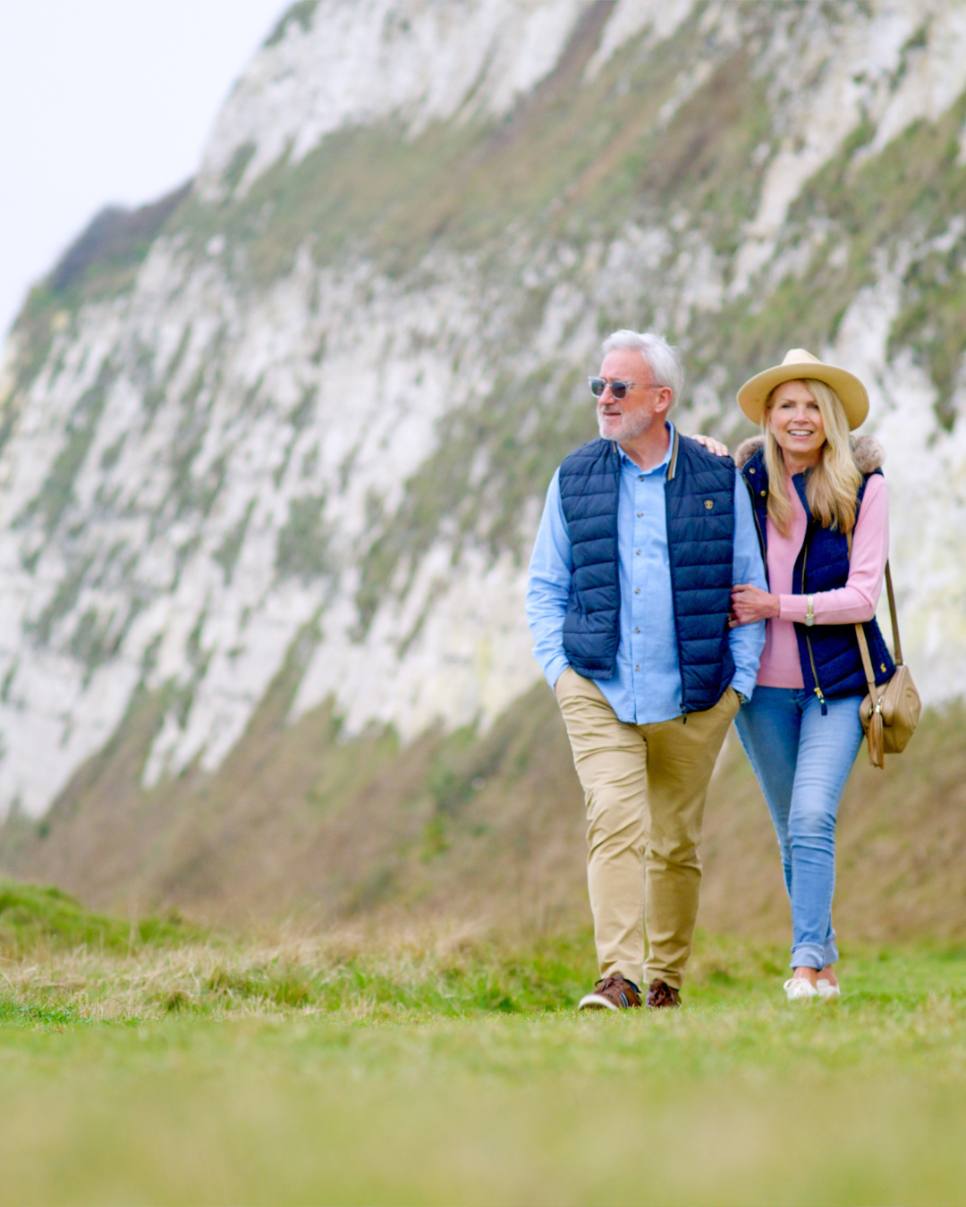 Couple walking along White Cliffs of Dover
