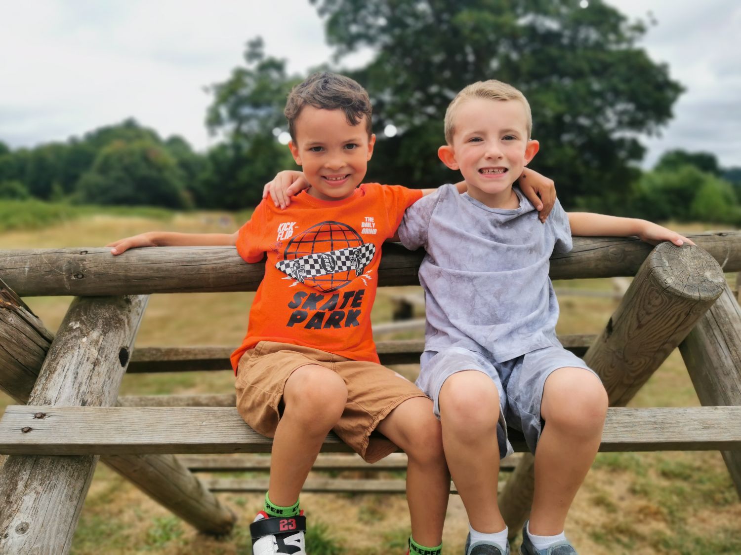 Two boys on a bench at Penshurt Place and Gardens