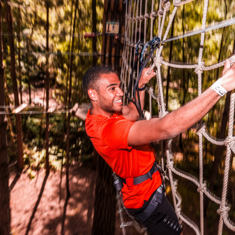 Man climbing net at Go Ape