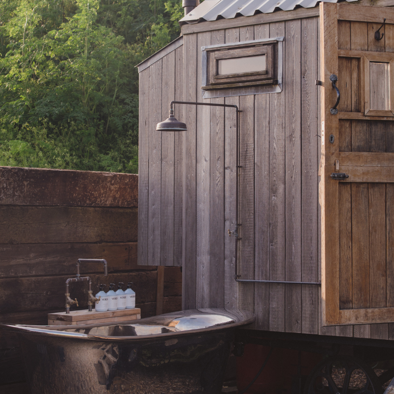 Outdoor bath and shower at Elmley Shepherds Huts