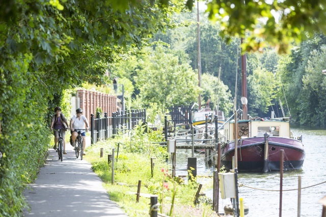 Cyclists on river pathsmall.jpg
