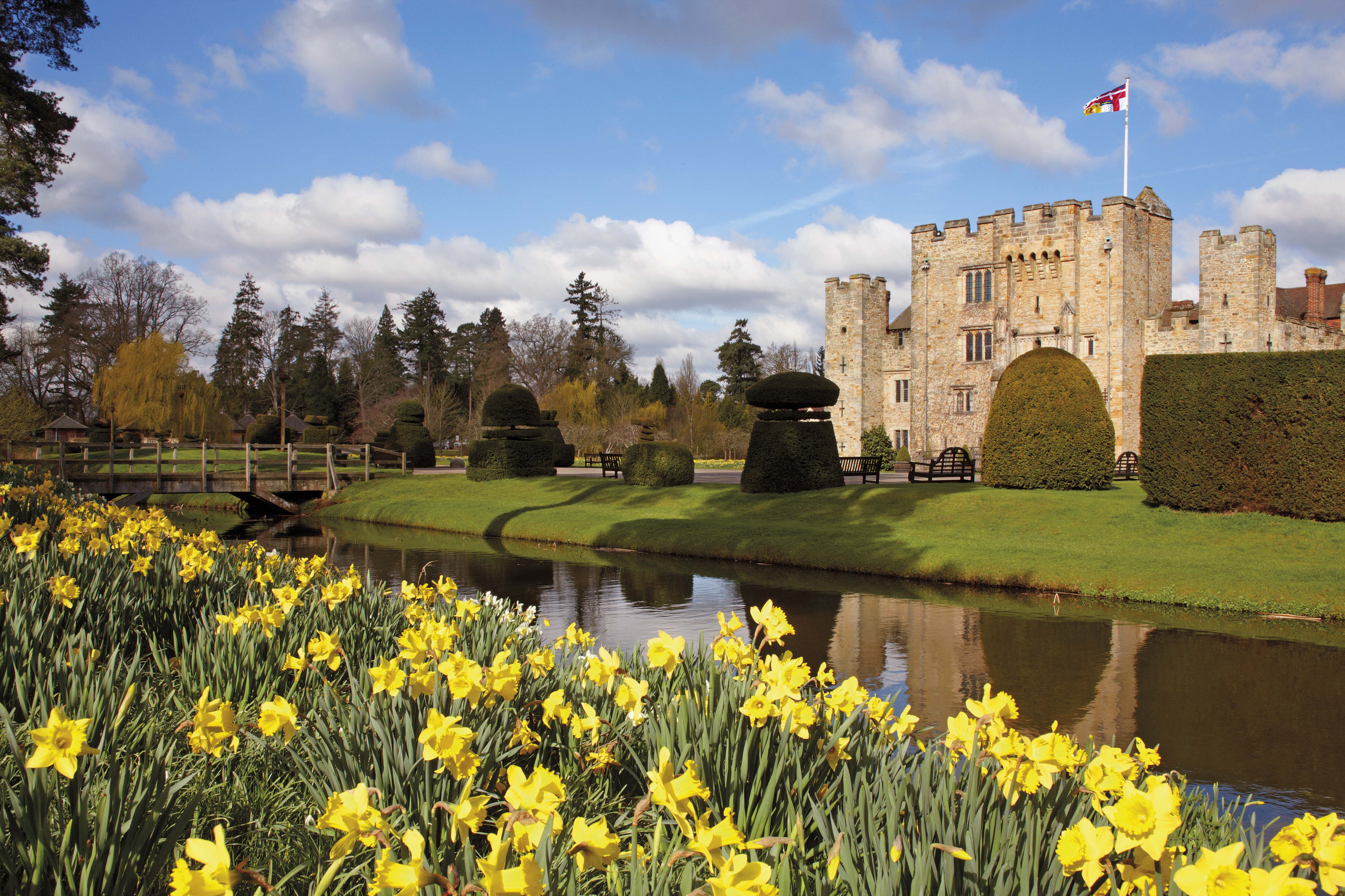 Hever Castle with daffodils in the foreground