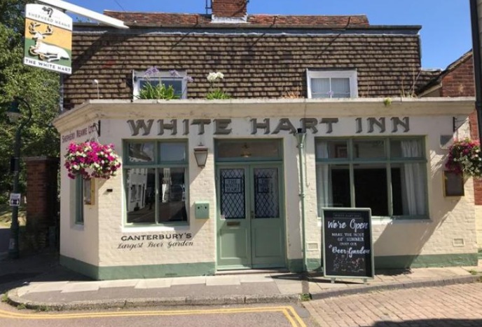 The White Hart Inn exterior, Canterbury in summer with flowers