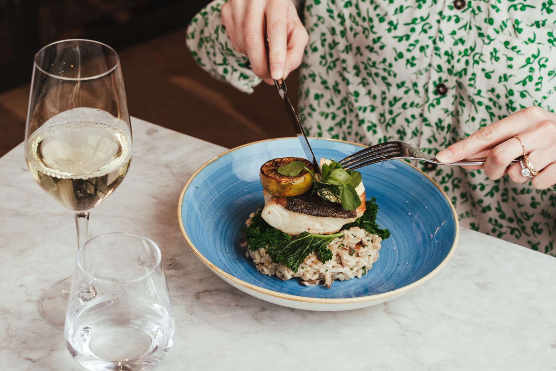 Glass of Balfour wine and dinner served at the Winemaker's Kitchen
