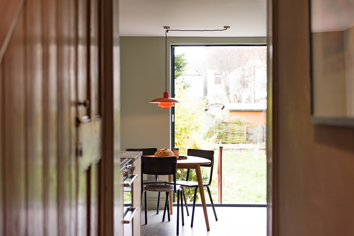 Door opening into kitchen with garden beyond
